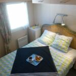 appartement-tsac21-luchon-chambre-acanthe- lit-pyrenees31